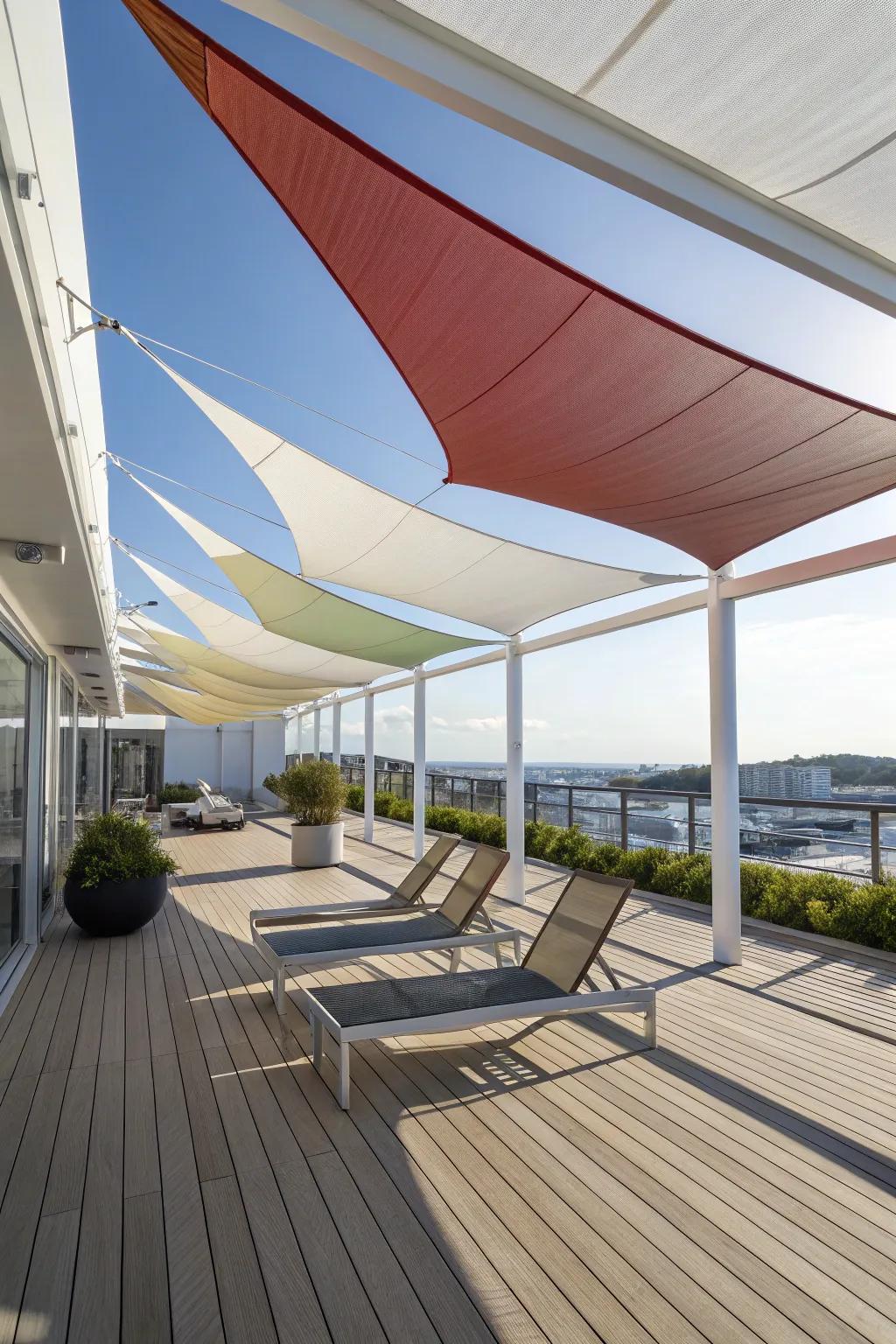 A contemporary deck with modern shade sails, providing flexible and stylish shade.