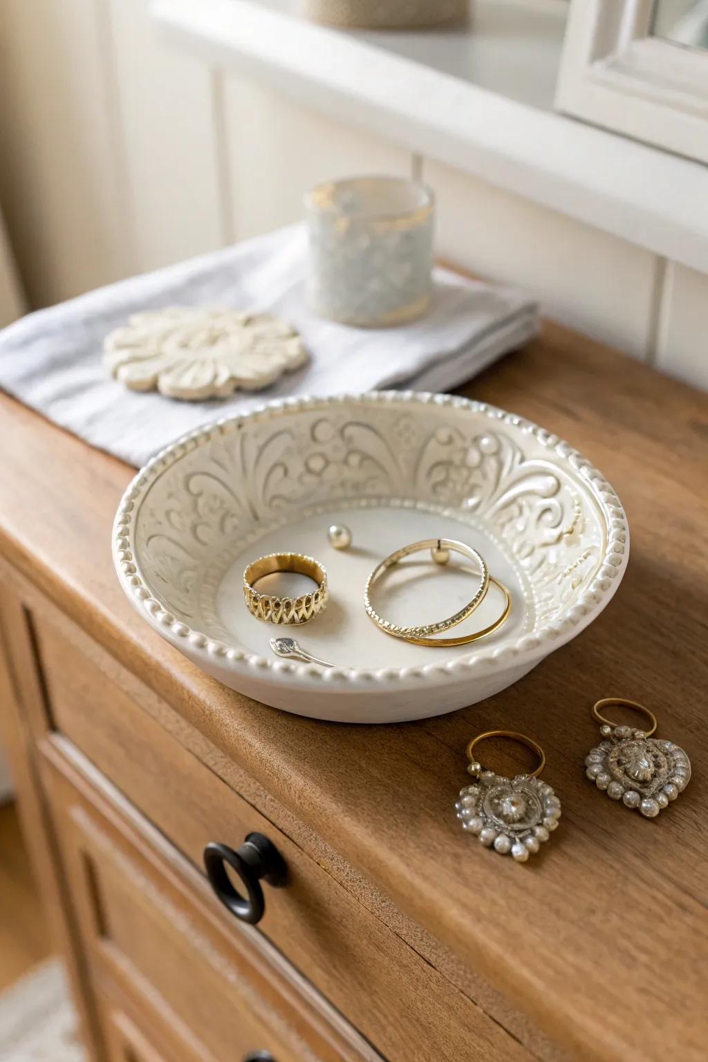 Elegance and function meet in a porcelain jewelry dish.