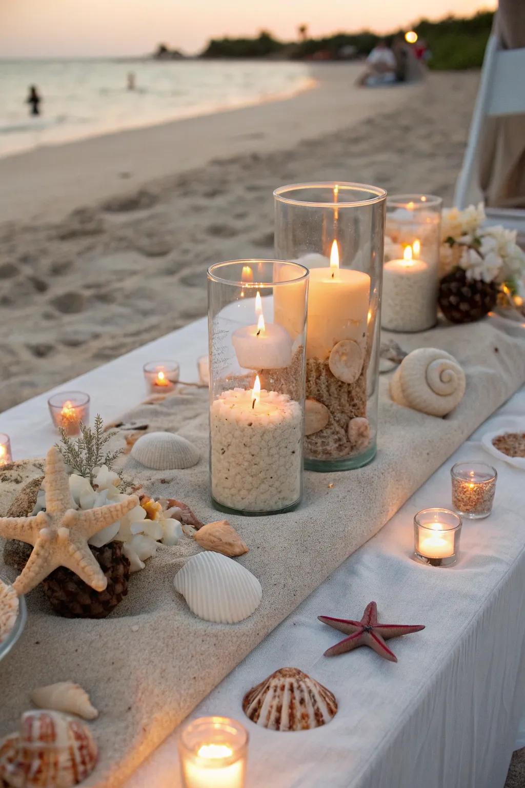 Elegant sandy centerpieces featuring seashells and candles.