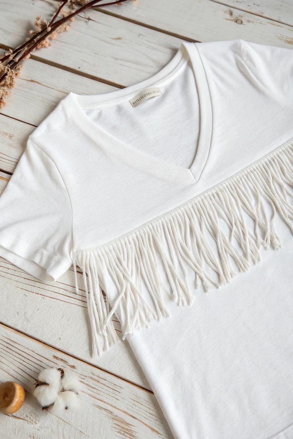 Transform your tee with a touch of fringe for effortless style and texture. #DIYFashion #MinimalistBoho