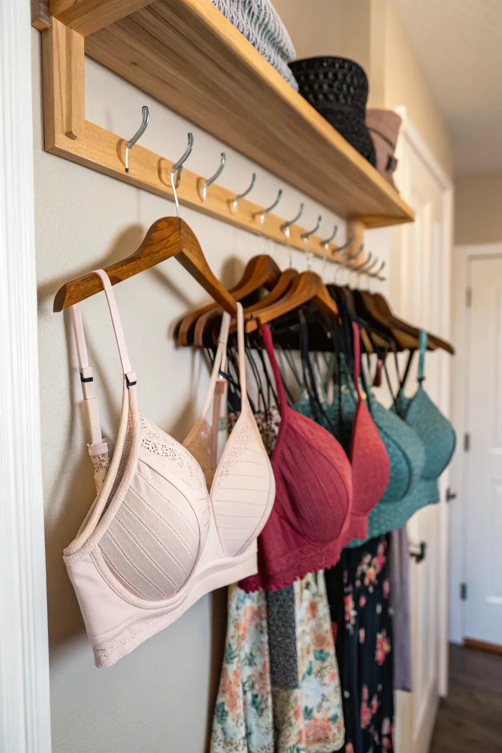 Hanging bras on hooks adds a boutique feel to your storage.