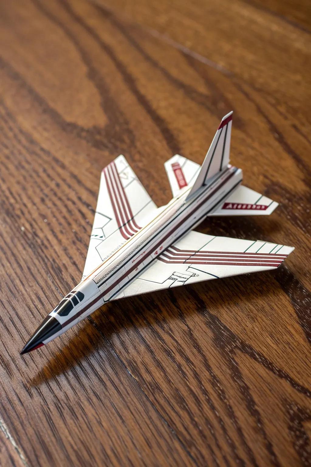 Unleash your inner pilot with this jet-inspired paper airplane, crafted for speed and style.