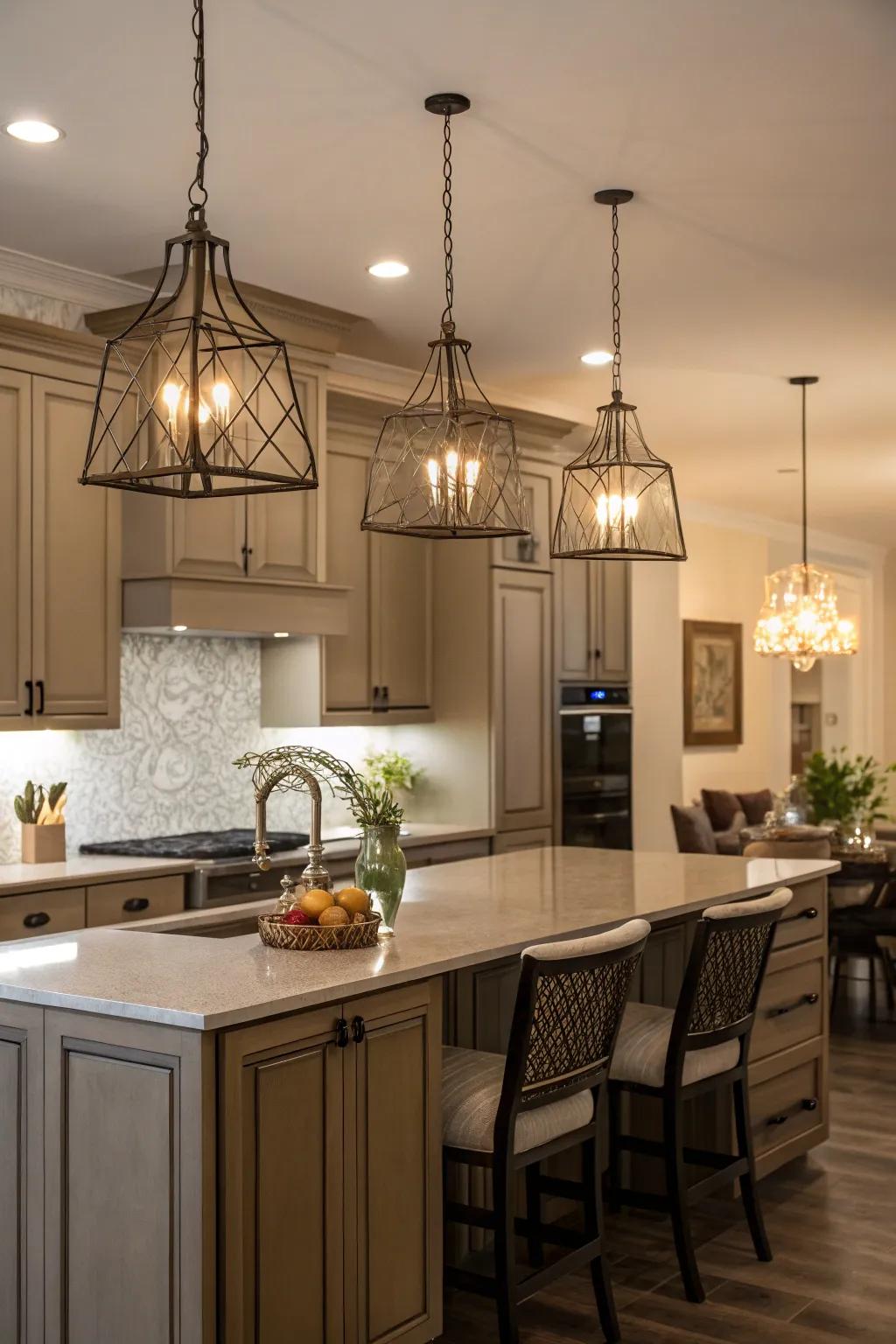 Contemporary lighting brings warmth and style to dark beige cabinetry.