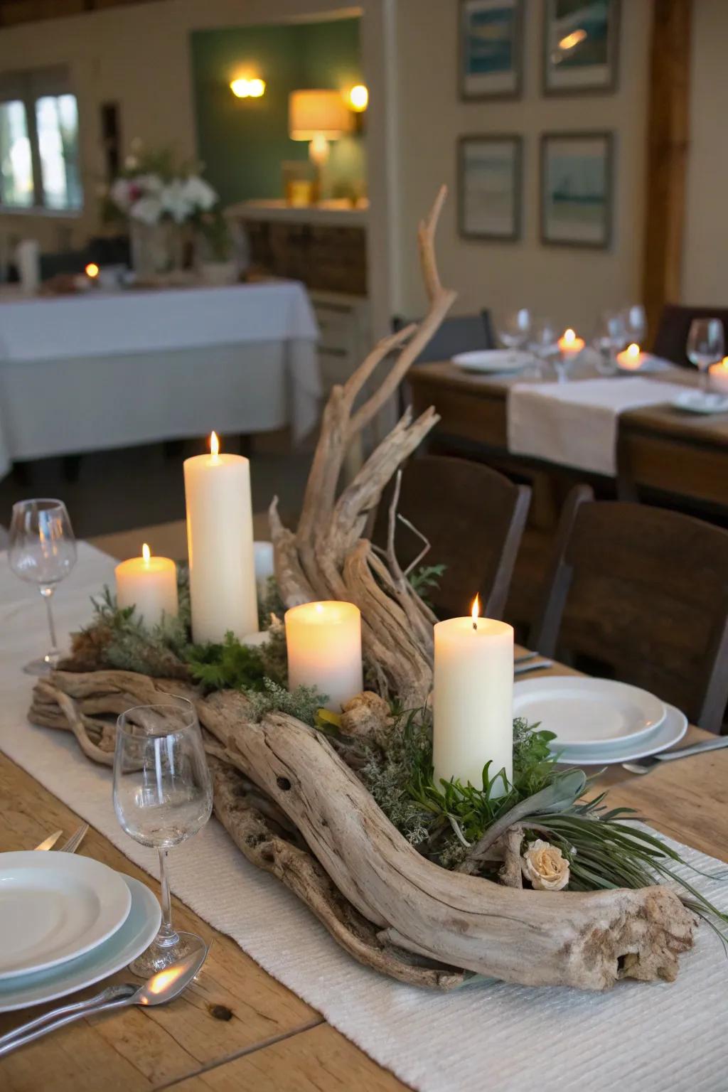 A driftwood planter with candles, setting a warm tone for a dinner gathering.