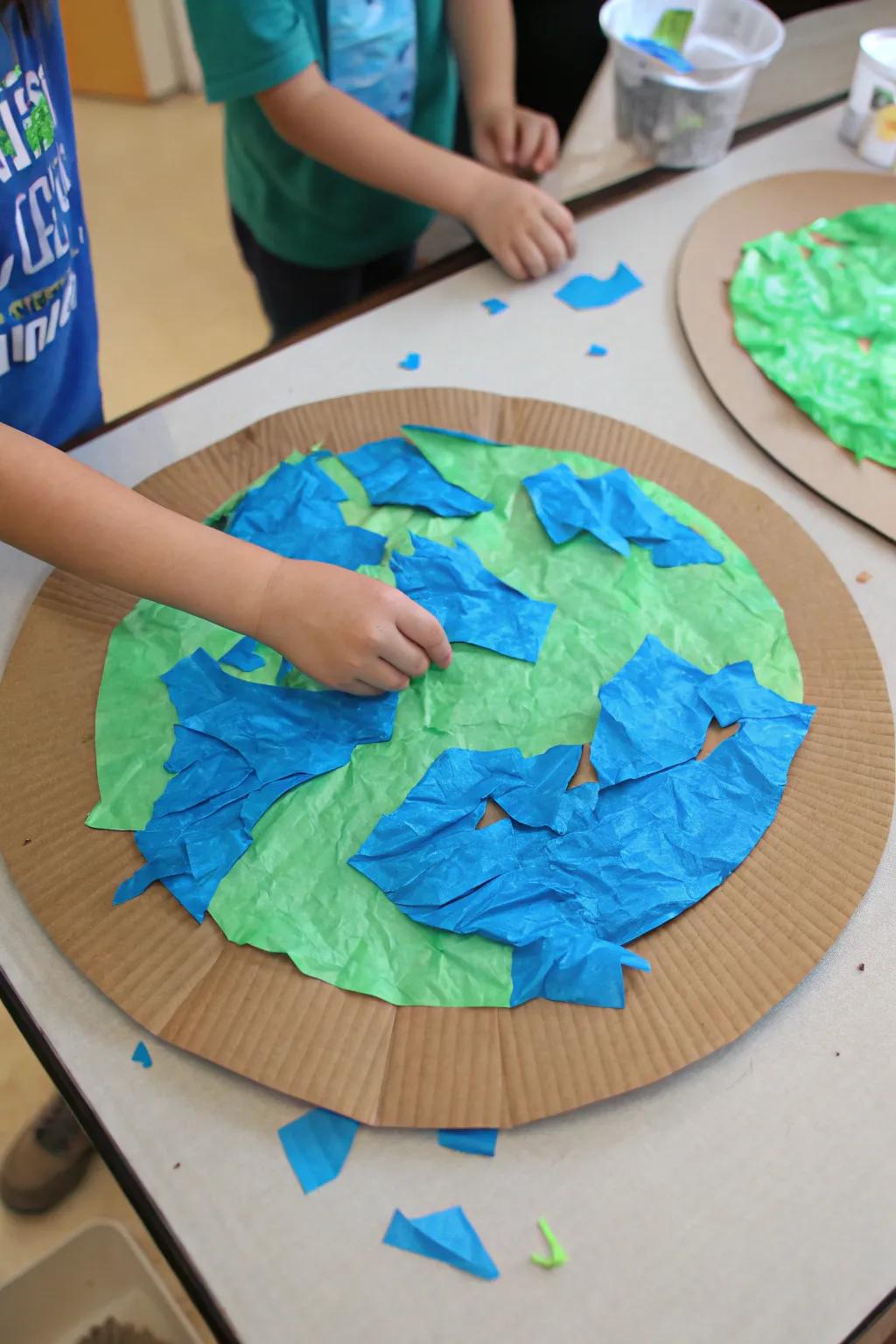 Create a colorful Earth using simple materials like tissue paper.