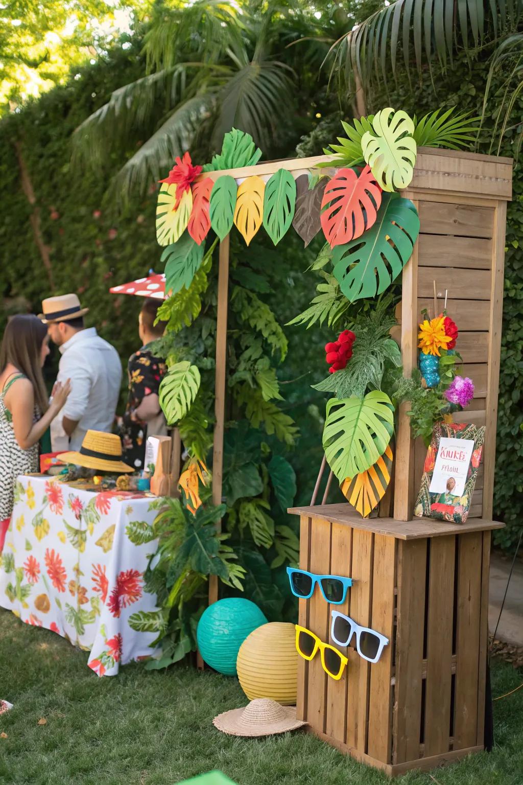 Capture memories with a vibrant photo booth filled with tropical props.