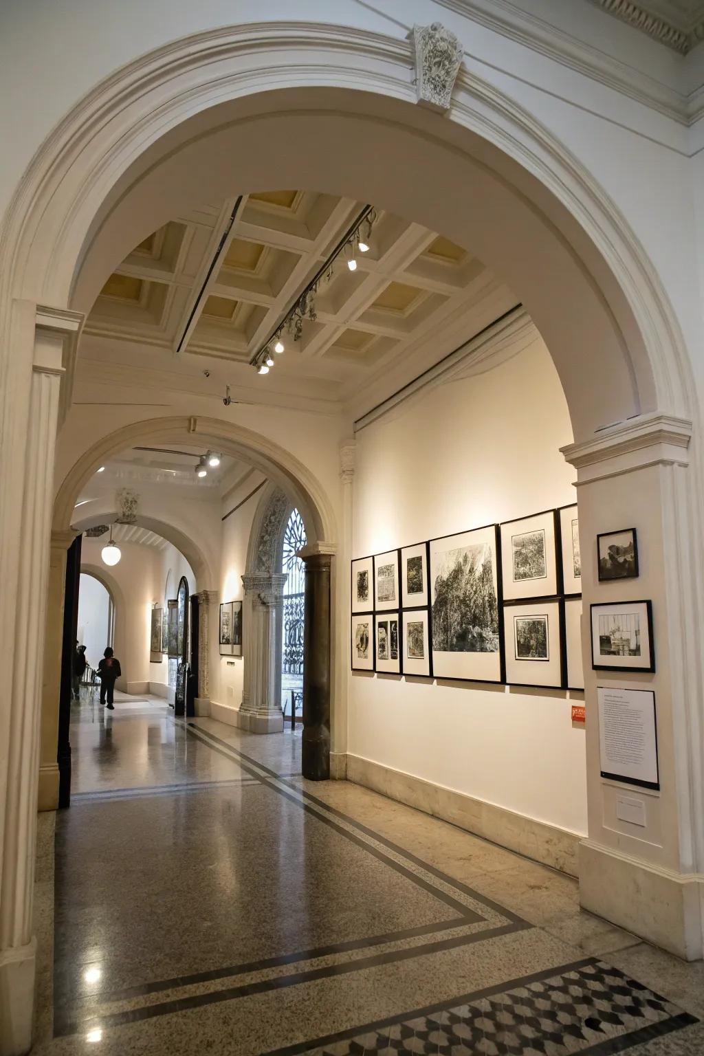 A gallery archway showcasing black and white artwork, adding personal flair.