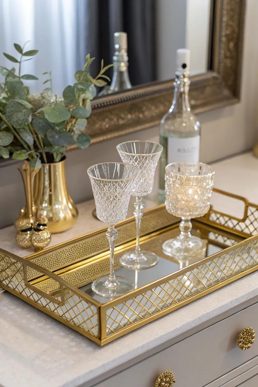 Add glamour with a gold tray and mirrored surfaces.