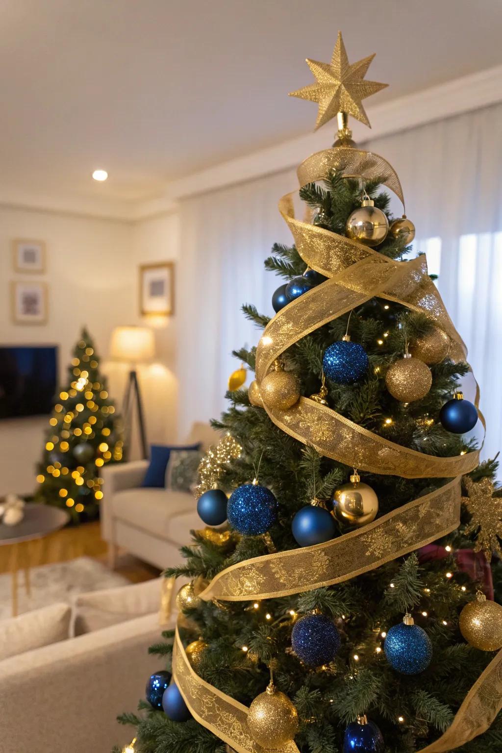 A glamorous Christmas tree adorned in blue and gold, perfect for a luxurious holiday setting.