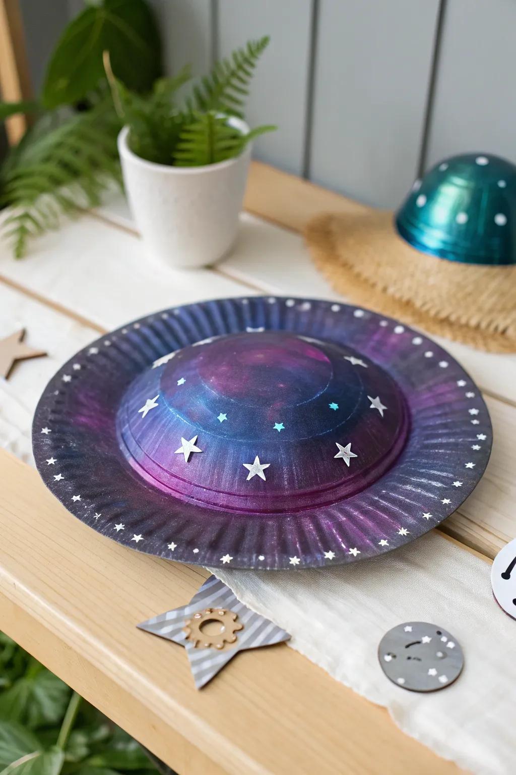 Explore the universe with this charming, galaxy-themed paper plate UFO—perfect for little astronauts and their imaginative journeys!