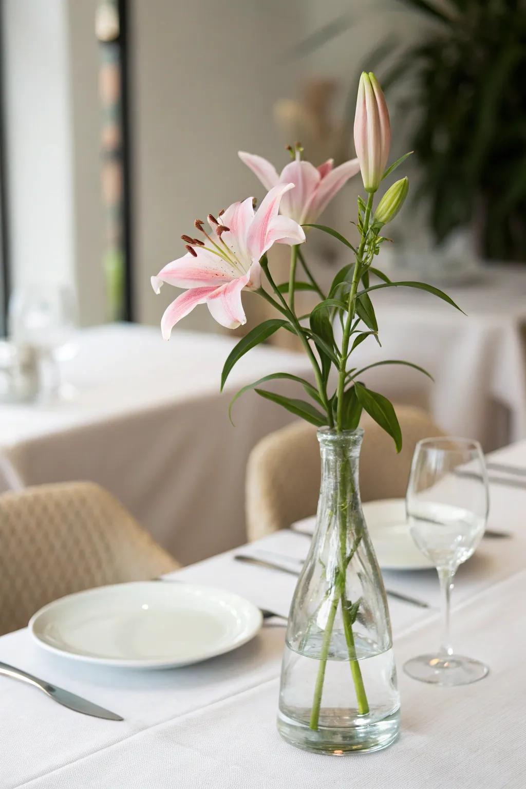 A minimalist centerpiece brings a modern touch to the dining table.