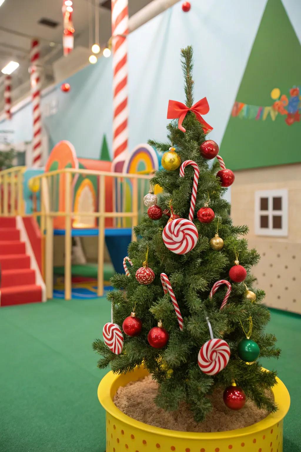 A whimsical mini Christmas tree with candy cane decorations.