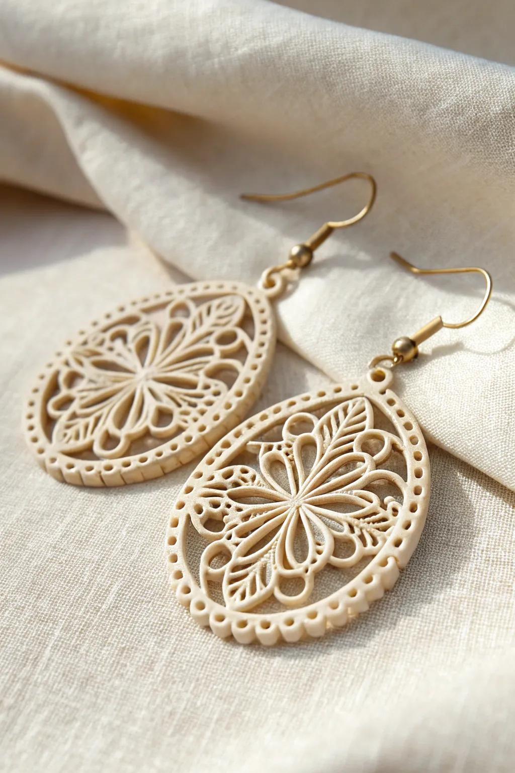 Discover the elegance of filigree with these handcrafted polymer clay earrings, where minimalism meets artistic charm.