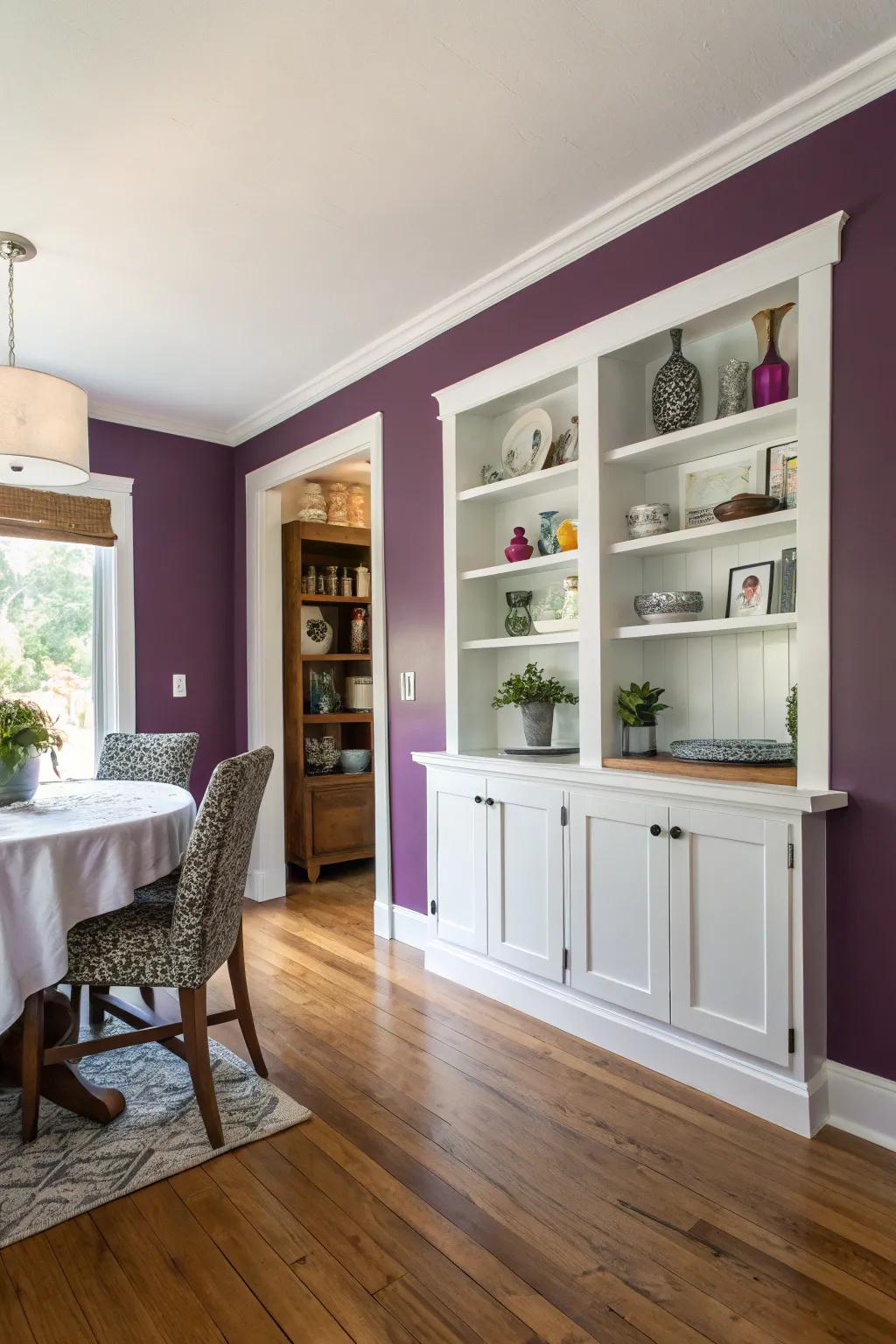 A purple accent wall adds depth and interest to the dining room.