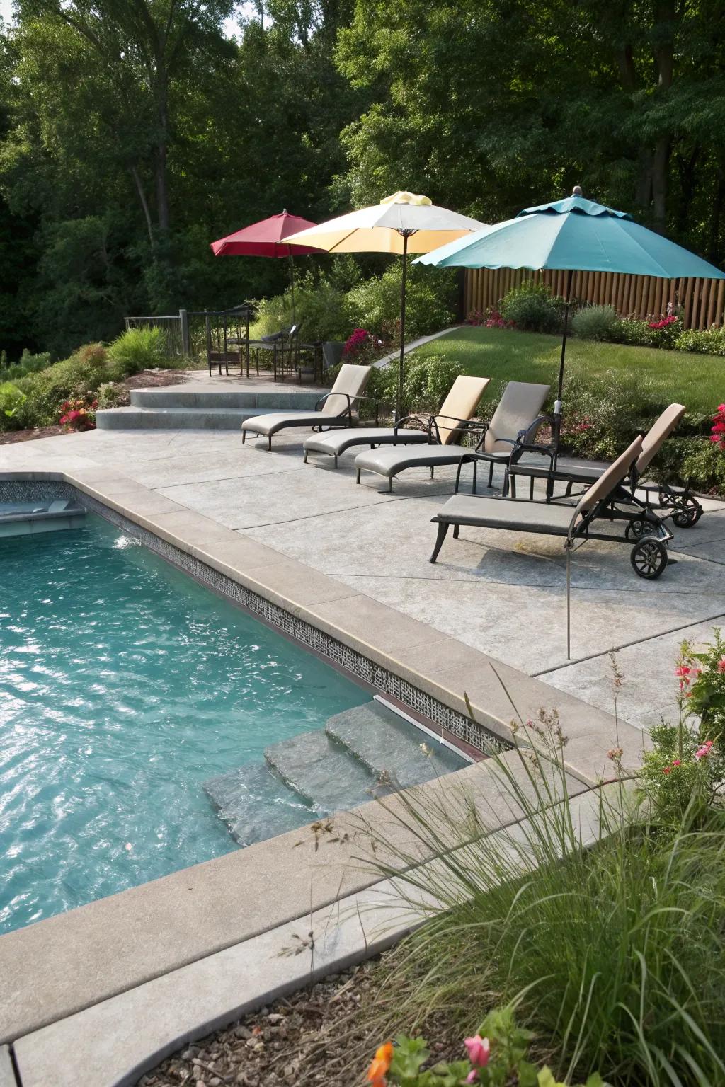 A poolside raised concrete patio that combines elegance with functionality.