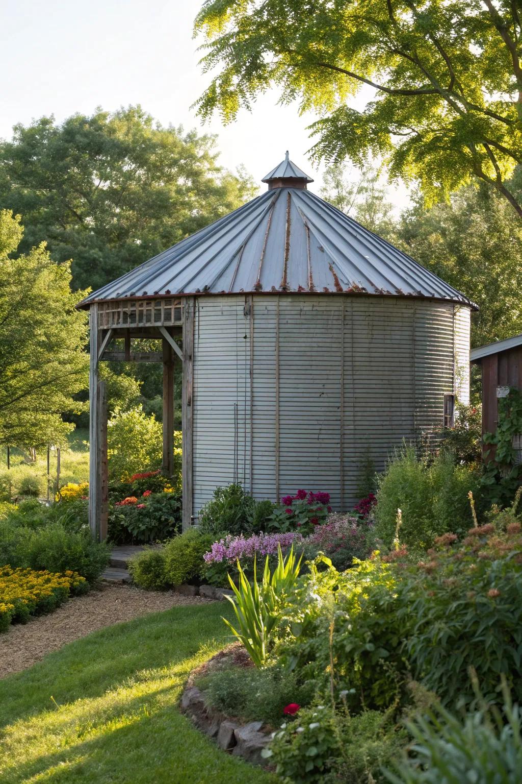 Transform your space into a hidden garden retreat with a repurposed grain bin gazebo surrounded by lush landscaping.