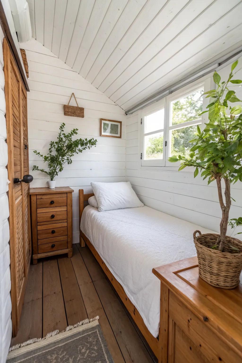 Natural elements add warmth and balance to a small white bedroom.