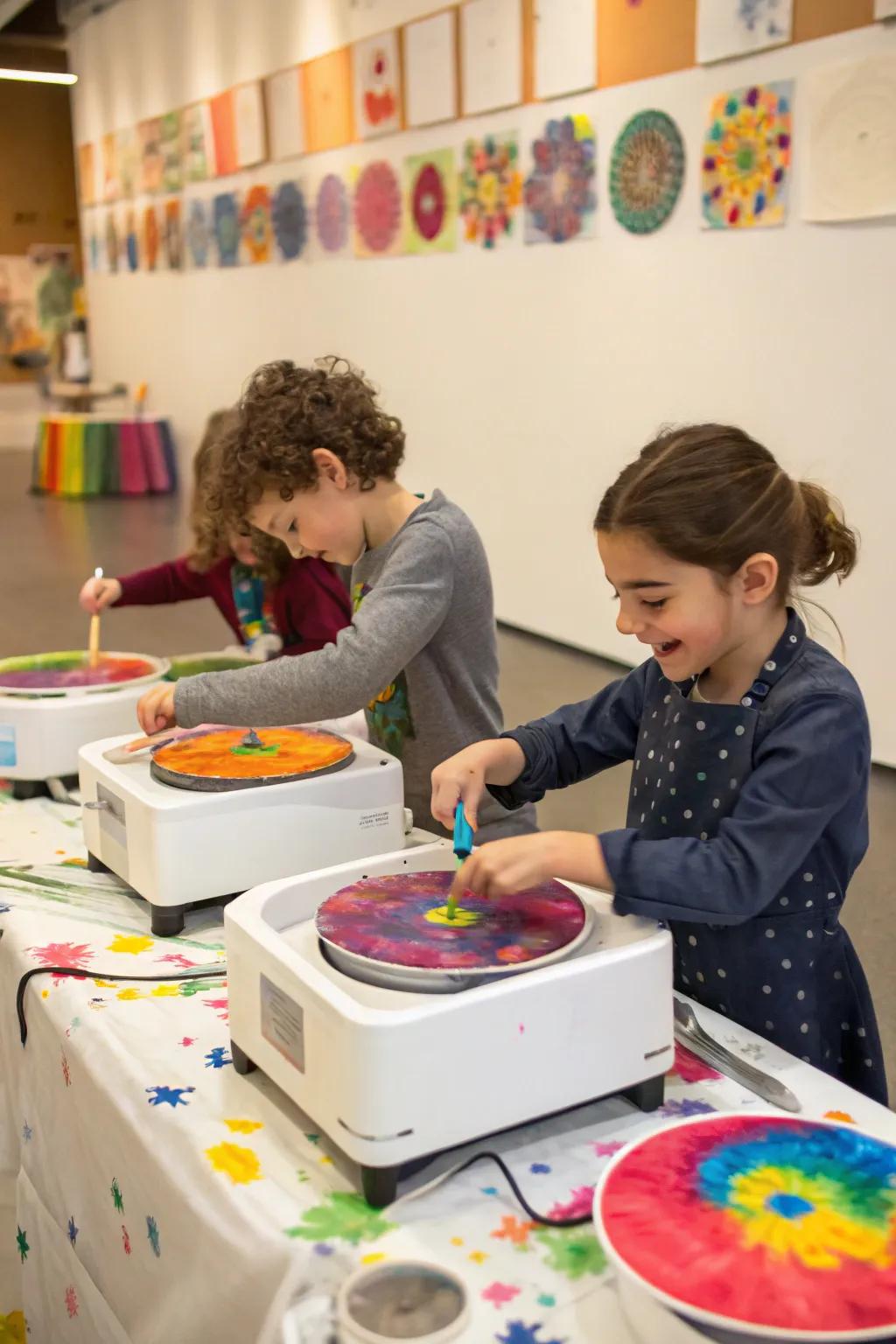 Kids captivated by the creation of spin art, resulting in colorful, swirling masterpieces.