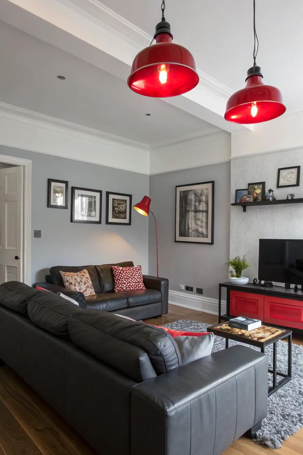 Red lighting adds warmth and complements the grey and black decor.