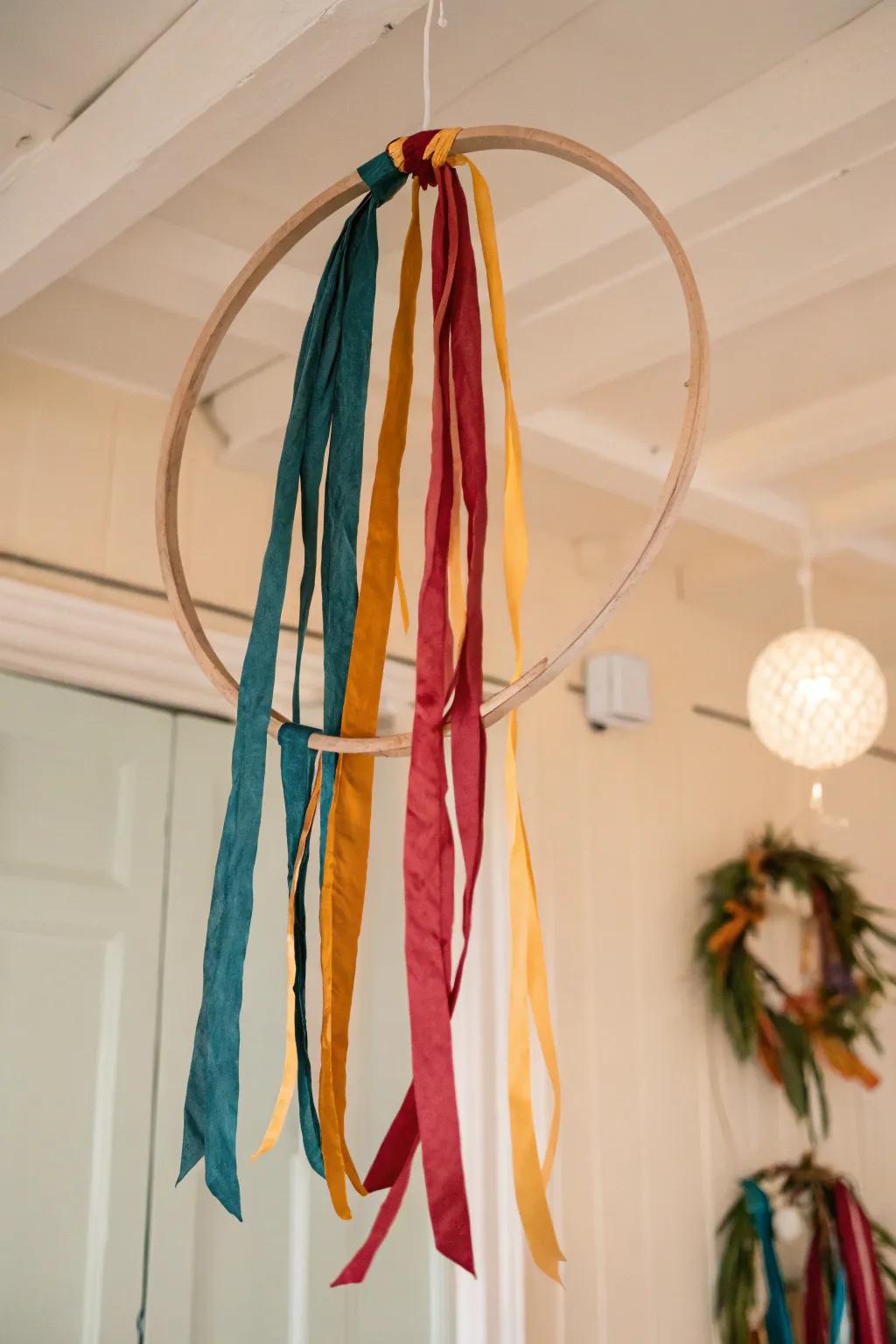 Elevate your space with a whimsical touch: a hoop transformed into a vibrant hanging decoration.