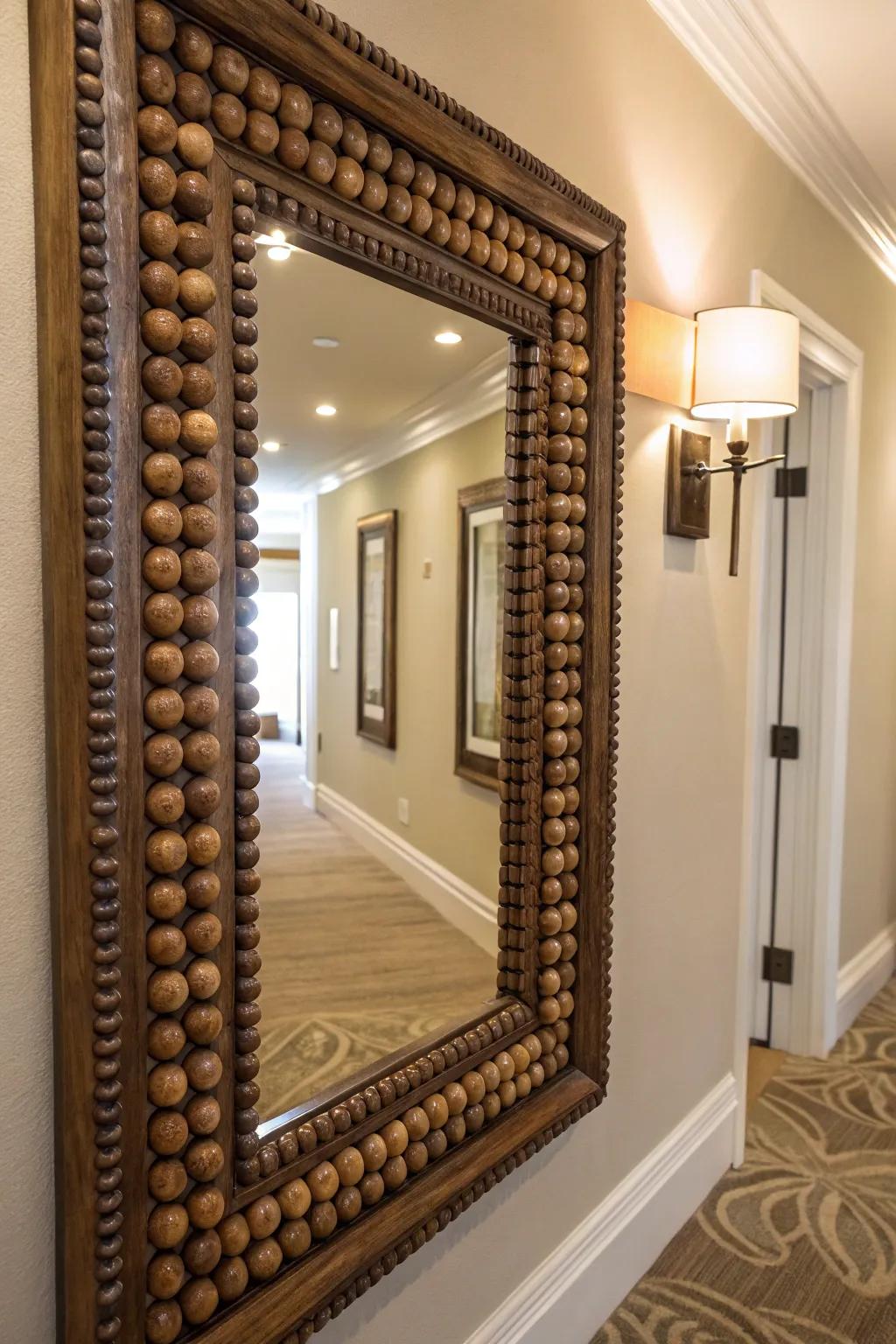 A mirror frame beautifully decorated with wooden beads.