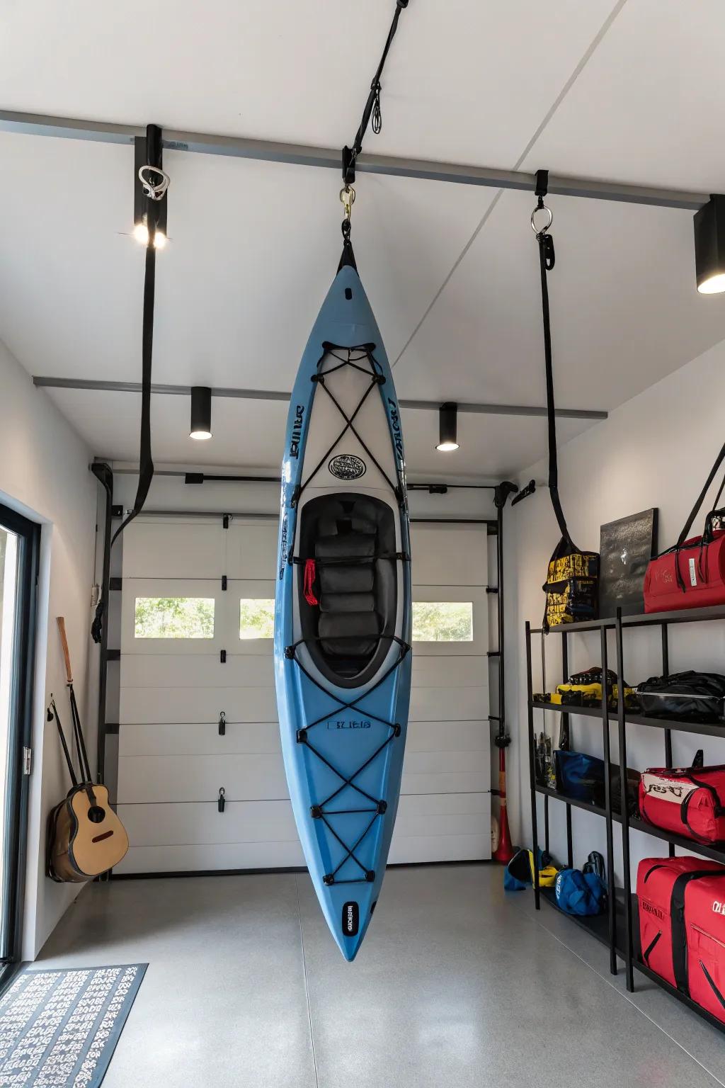 Minimalist kayak storage using heavy-duty straps in a modern garage.