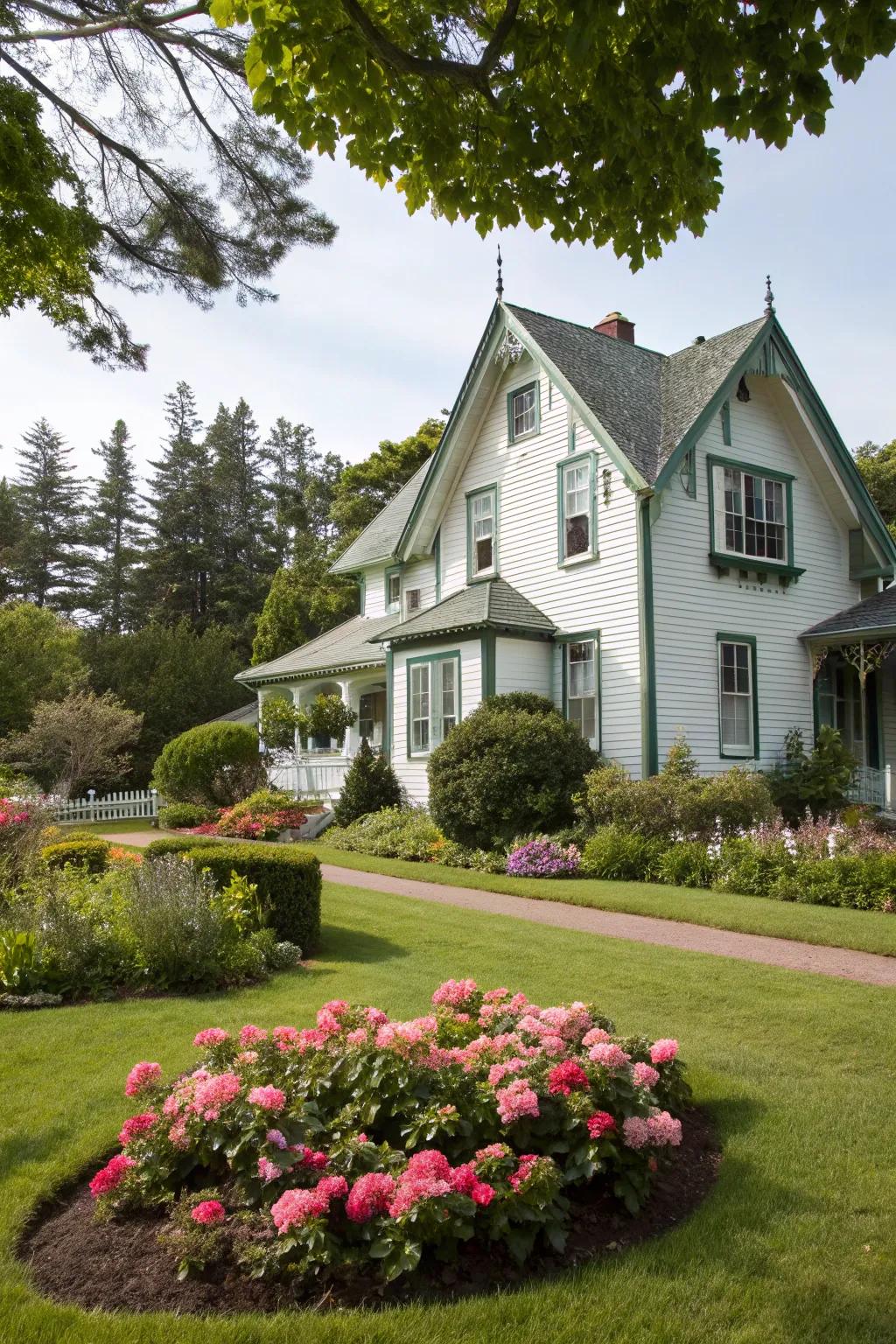 Green trim harmonizes with nature, creating a serene atmosphere for this white home.