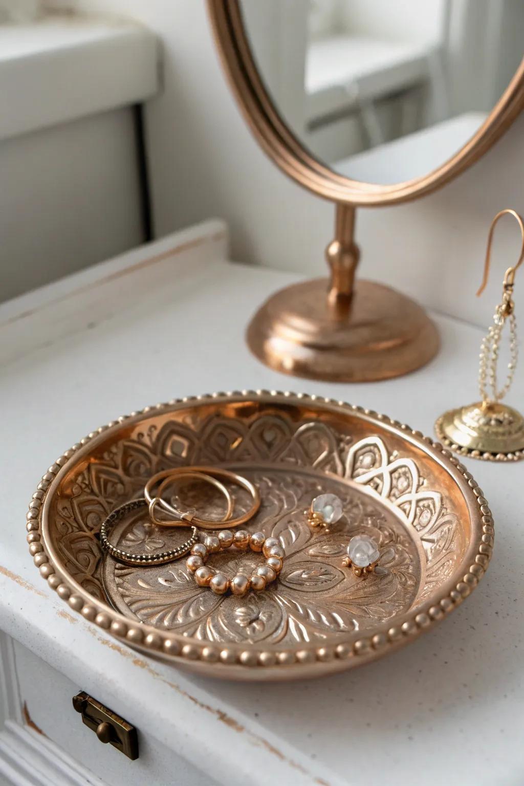 Keep precious items safe in an elegant bronze dish.