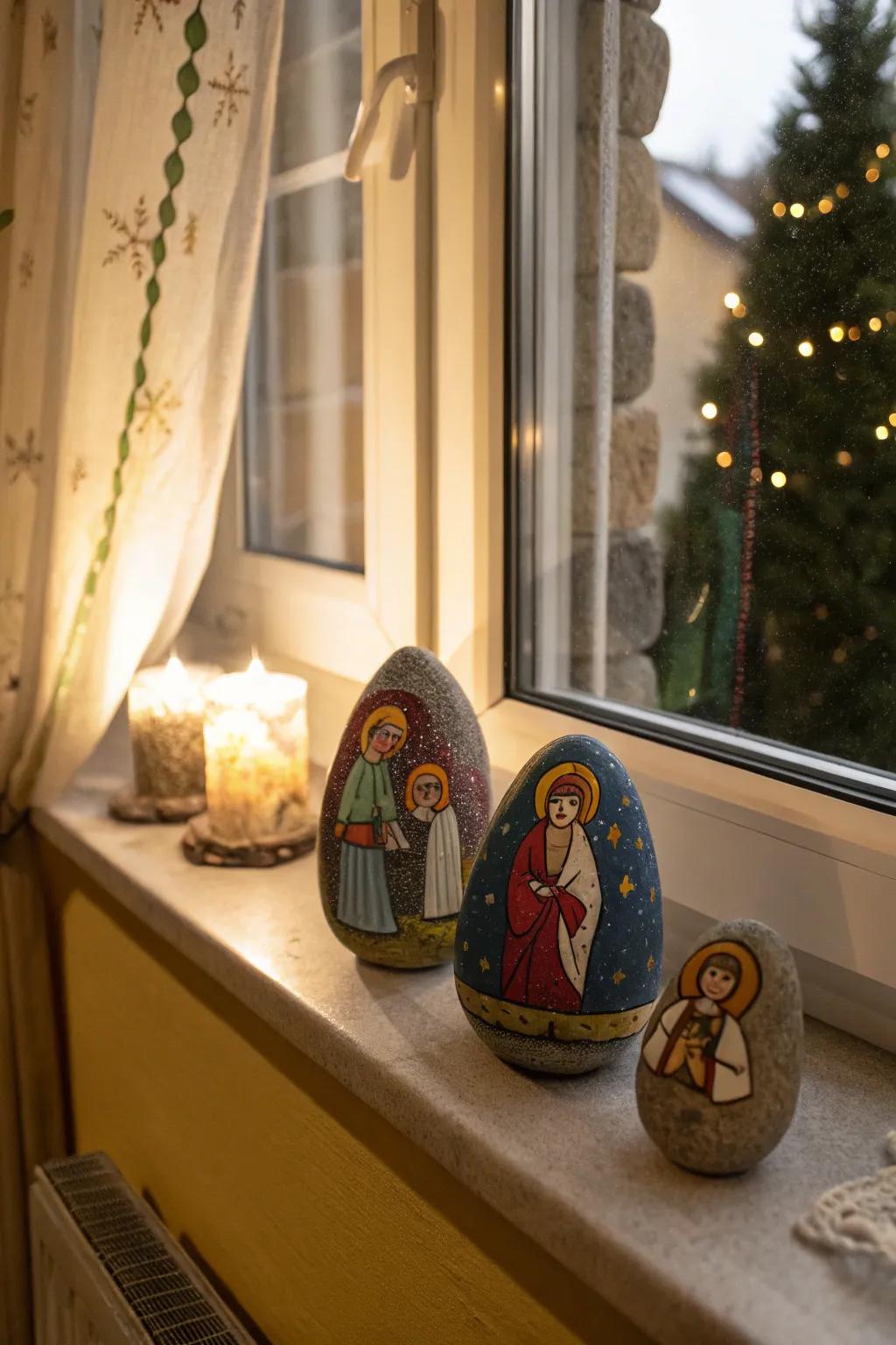 Painted stones create a unique and artistic nativity scene.