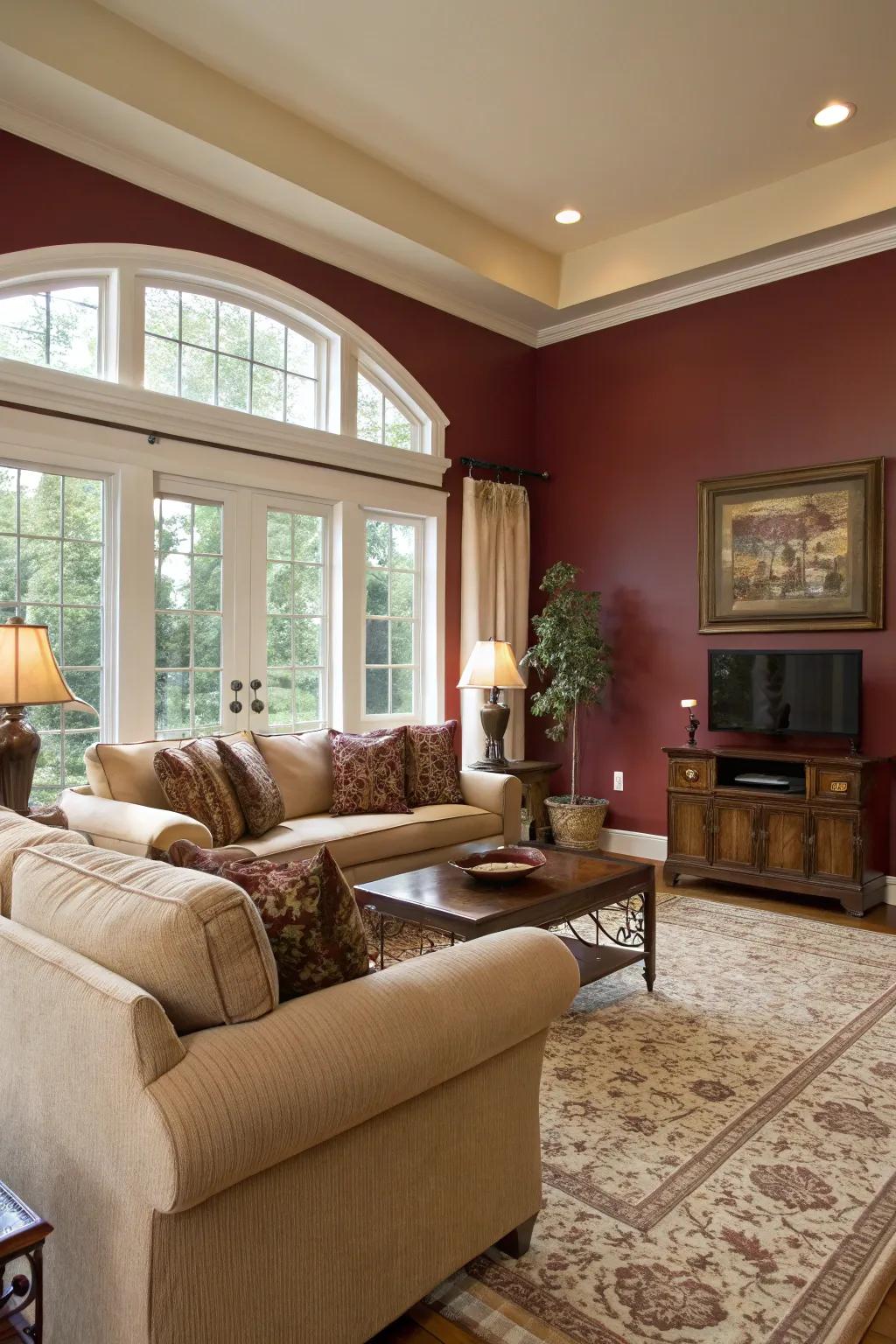 A burgundy accent wall adds luxurious sophistication to this living room.