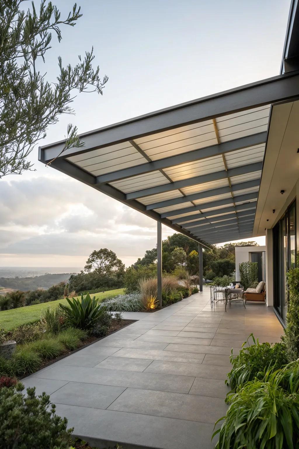 A cantilevered metal roof provides unobstructed shade and modern style to this open patio.