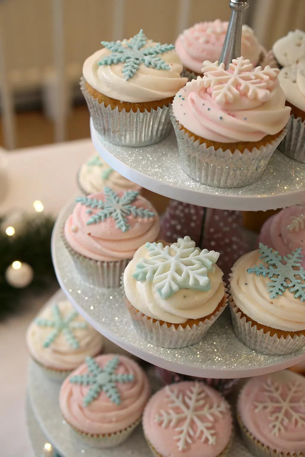 Cupcakes adorned with fondant snowflakes create a stunning centerpiece.