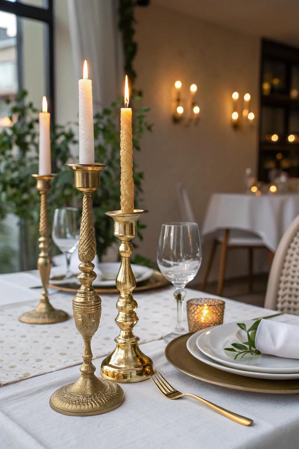 Gold candle holders add a warm glow to the anniversary setting.