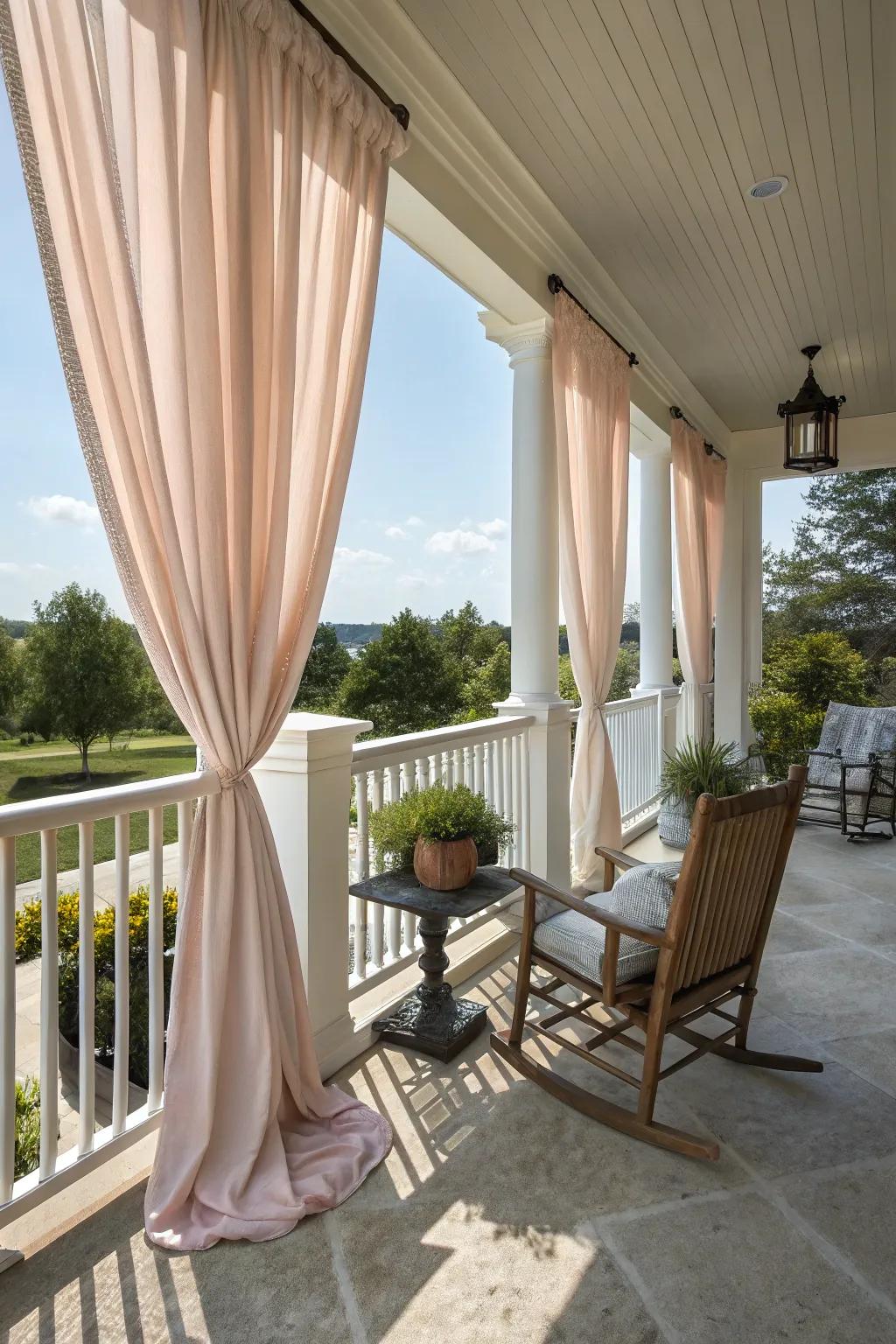 Drapes add privacy and elegance to the porch.