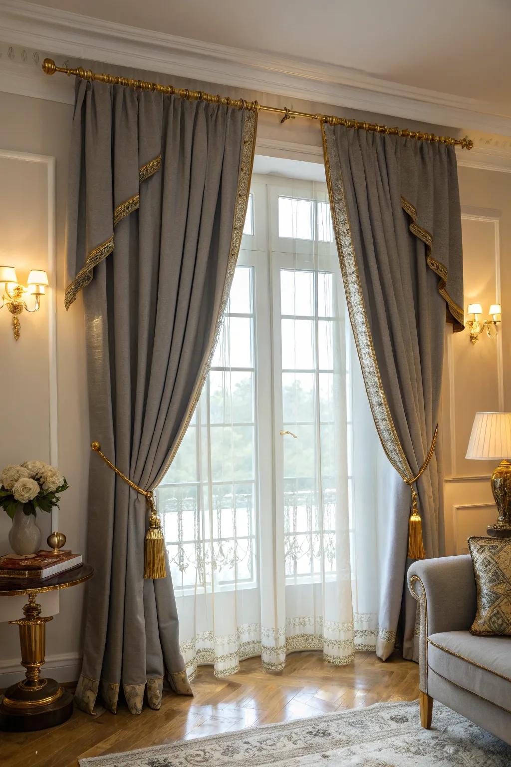 Sophisticated grey drapes with gold tiebacks.