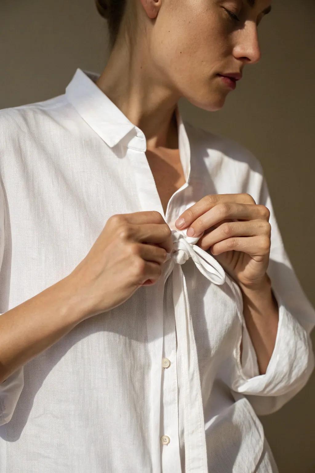 Master the art of the smooth front knot for a chic and polished look.