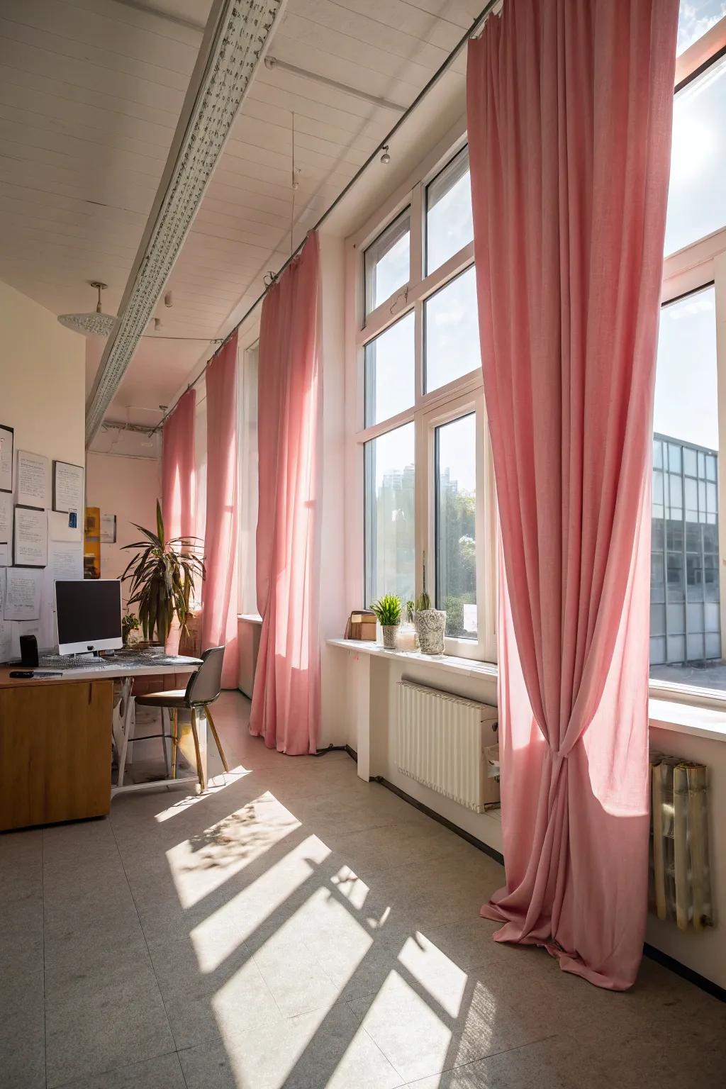 Pink curtains add warmth and a soft touch to your office.