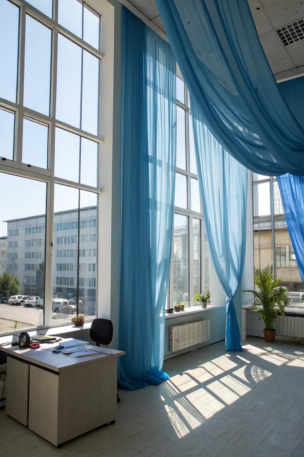 Blue curtains add texture and ambiance.