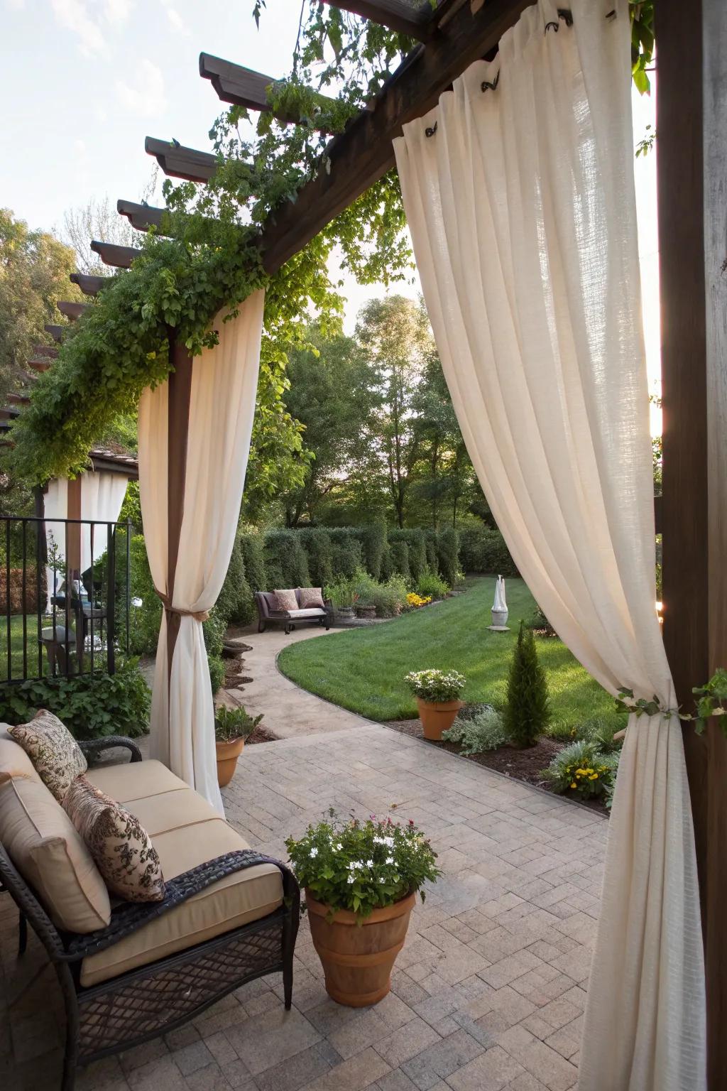 Outdoor curtains provide privacy and elegance.