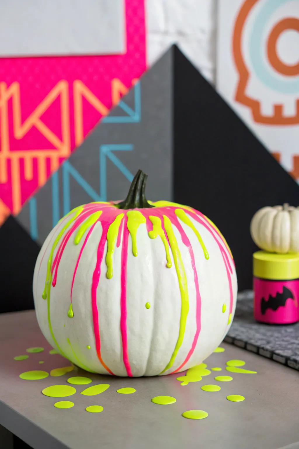 Neon drip designs offer a bold and colorful take on pumpkin decorating.