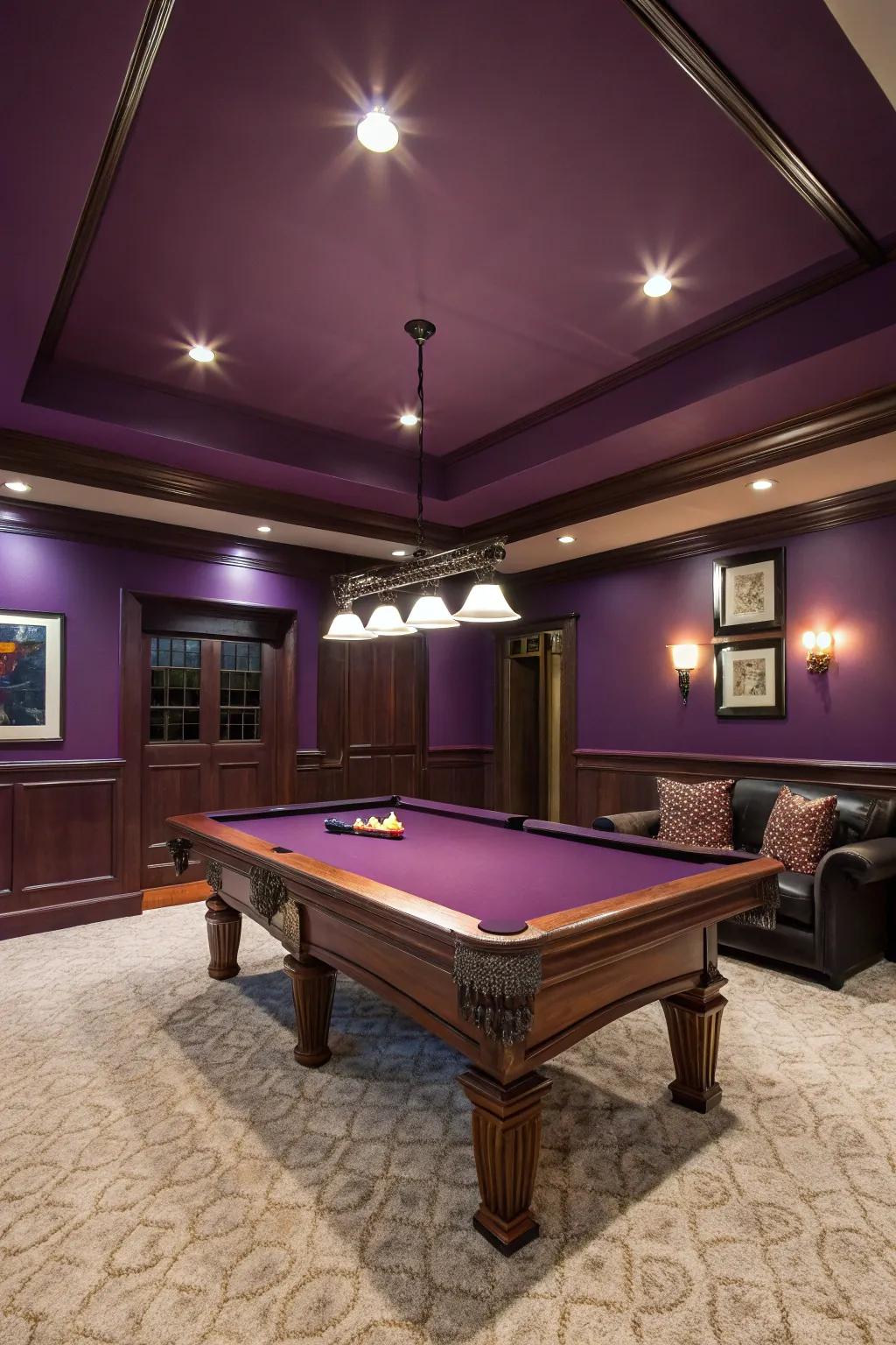 Deep purple walls add a touch of regality and drama to this game room.