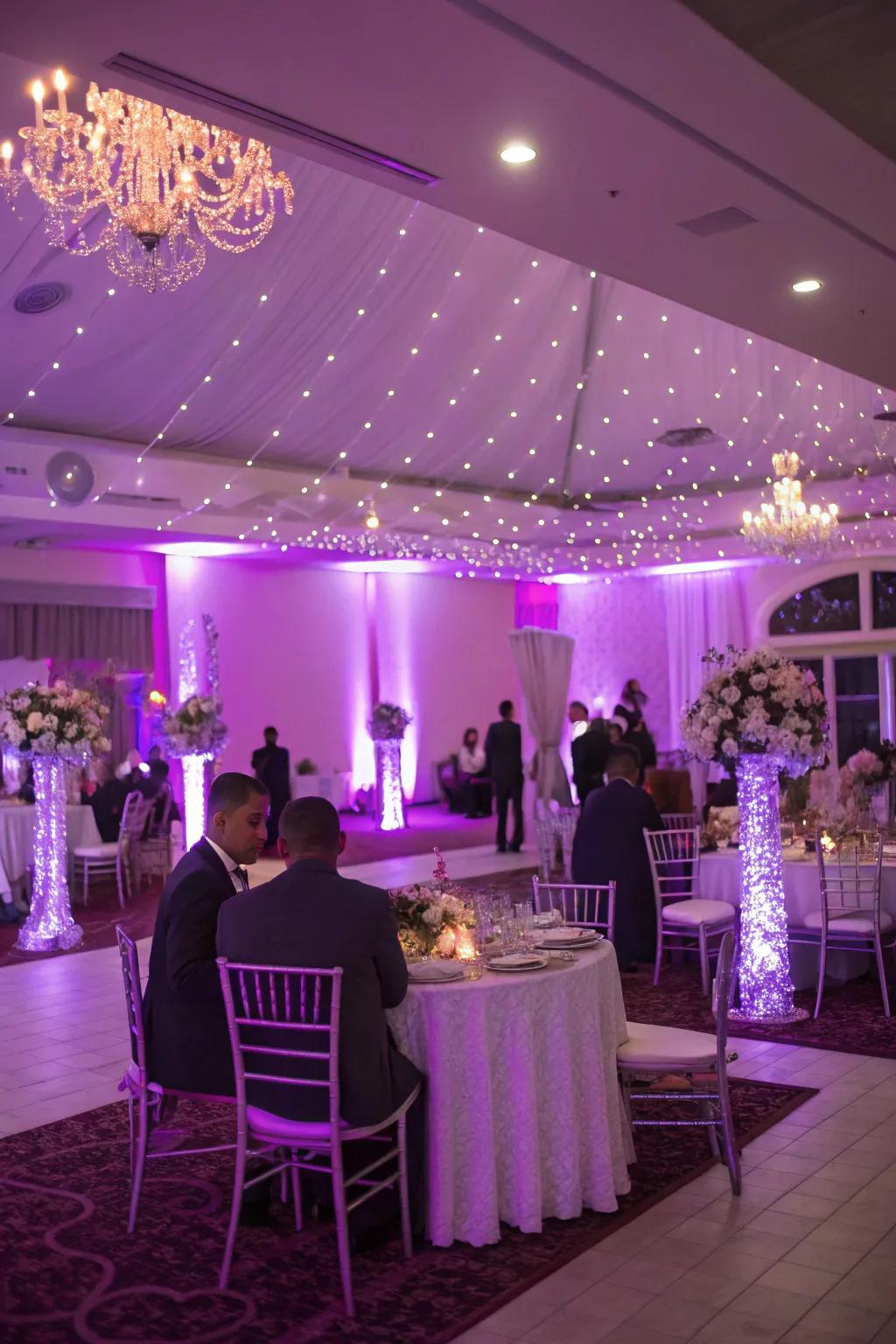 Reception venue bathed in enchanting purple lighting.