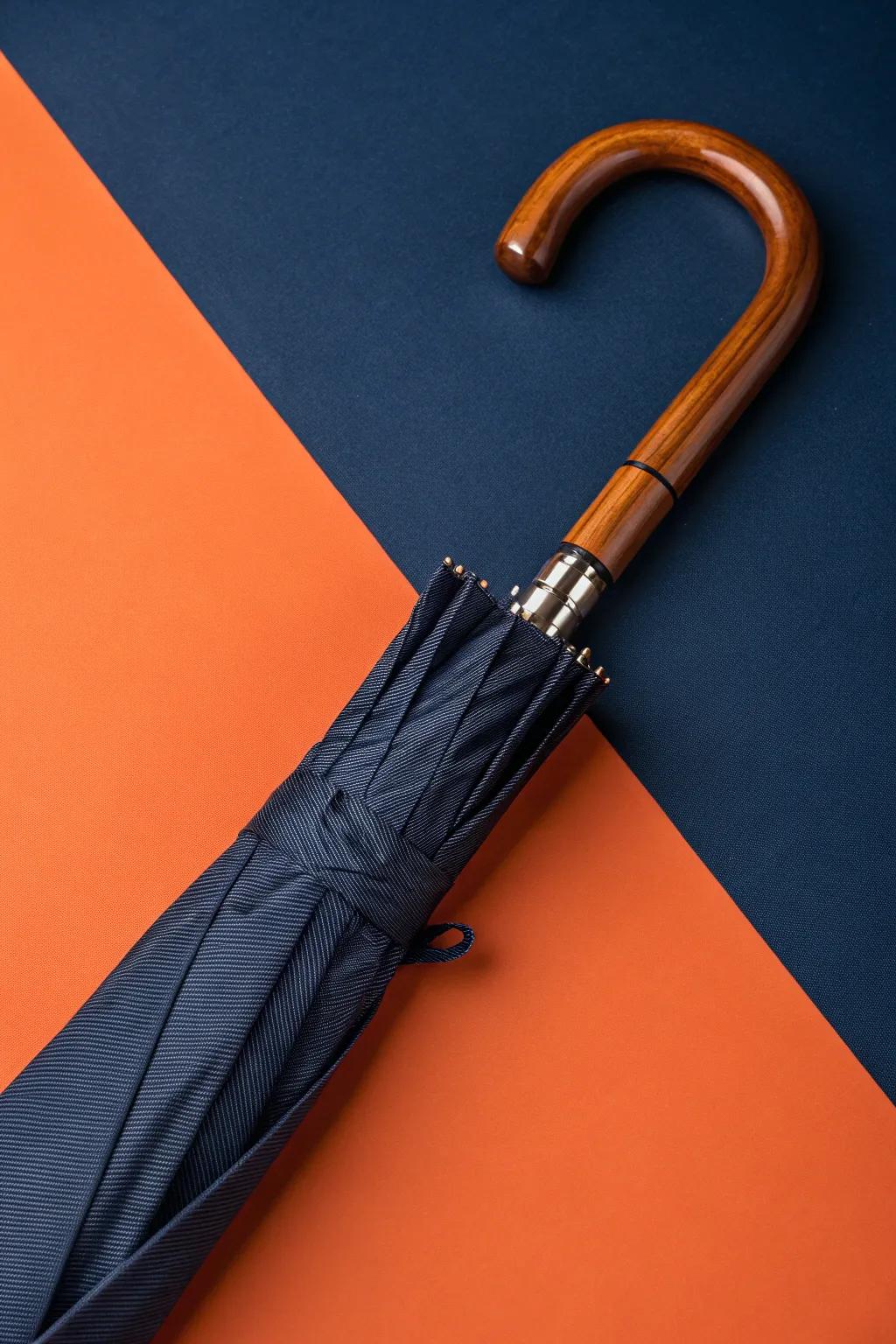 Stay stylishly prepared for any weather with this finely crafted compact travel umbrella.