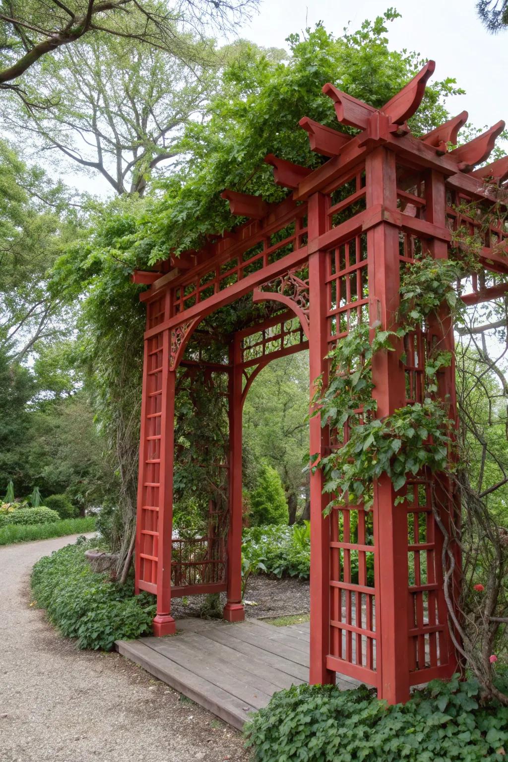 A bold-colored trellis arbor stands out in the garden.