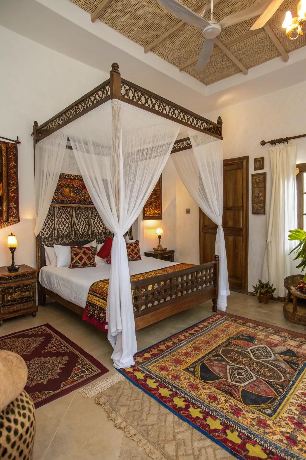 A classic canopy bed draped with sheer fabrics in an African-inspired bedroom.