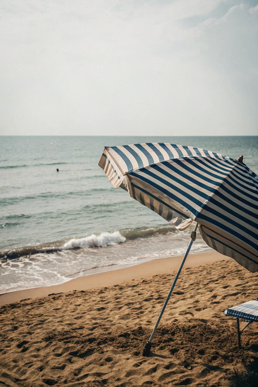 Beach umbrellas offer both shade and style for your coastal setting.