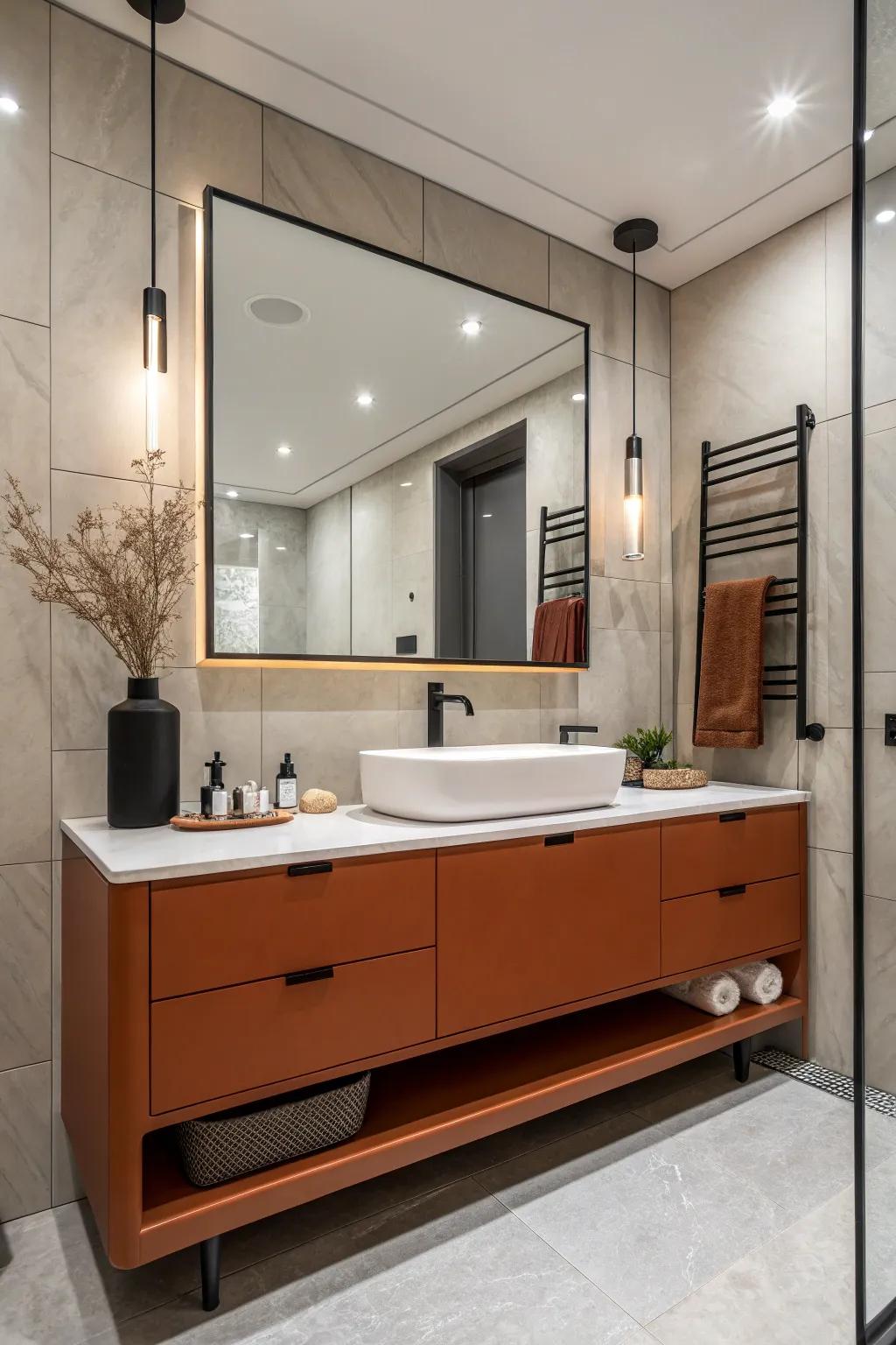 A burnt orange vanity serves as the bold centerpiece of this bathroom.