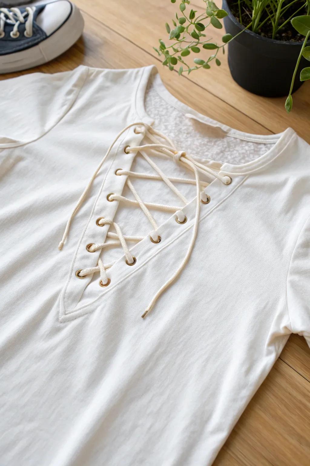 Transform your T-shirt with a romantic lace-up neckline for a chic, boho-inspired look.
