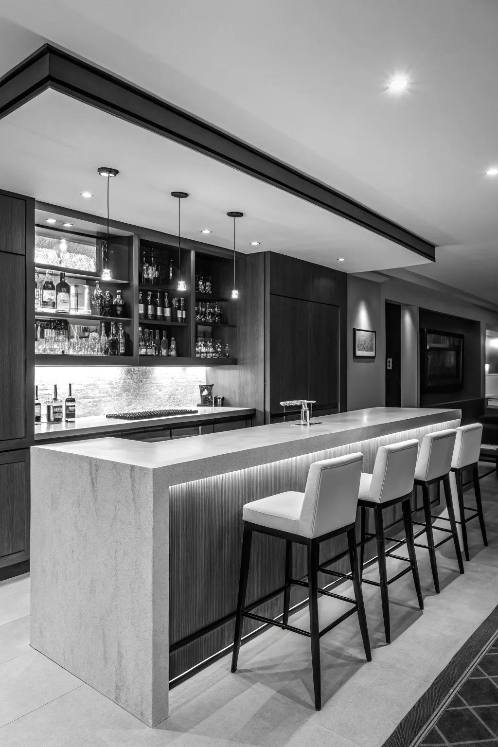 A monochrome palette delivers a sleek and modern home bar design.