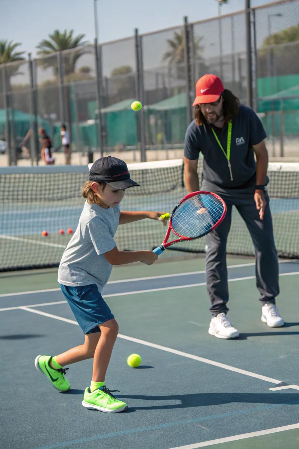 A young athlete honing their skills on the tennis court.